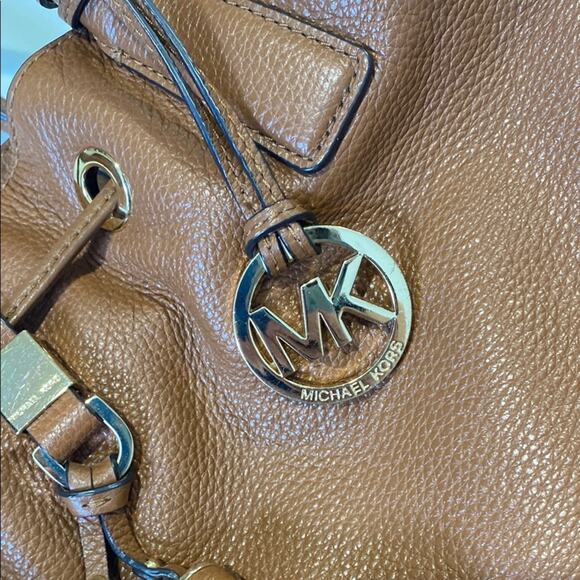 Michael Kors Brown Shoulder Bag with Tassel and Drawstring Accents - Picture 2 of 8